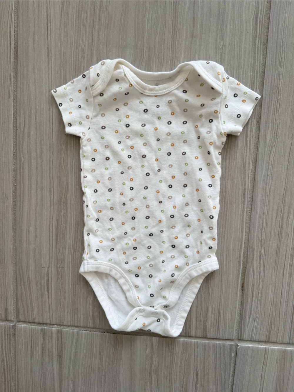 Simple White Bodysuit with Black, Green, and Tan Dot Print